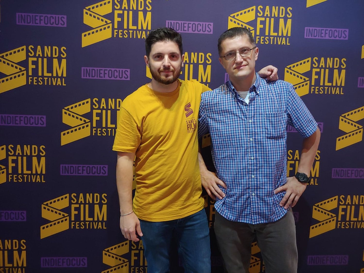 Sands Film Festival creators Irhad and Alen Mutic pose in front of the Sands Film Festival wall. The event was held April 13-14 at Players by the Sea theater in Jacksonville Beach.